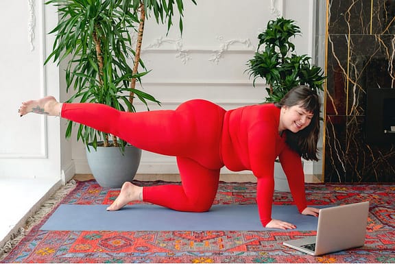 an obese lady working out