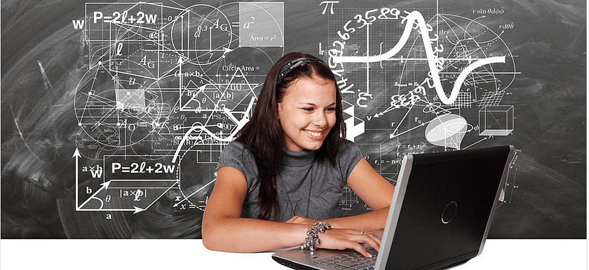 a student with a laptop